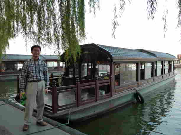 Riding a boat in Han Zhou