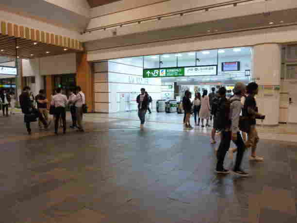 Salaried workers rushing to get onto the last train home